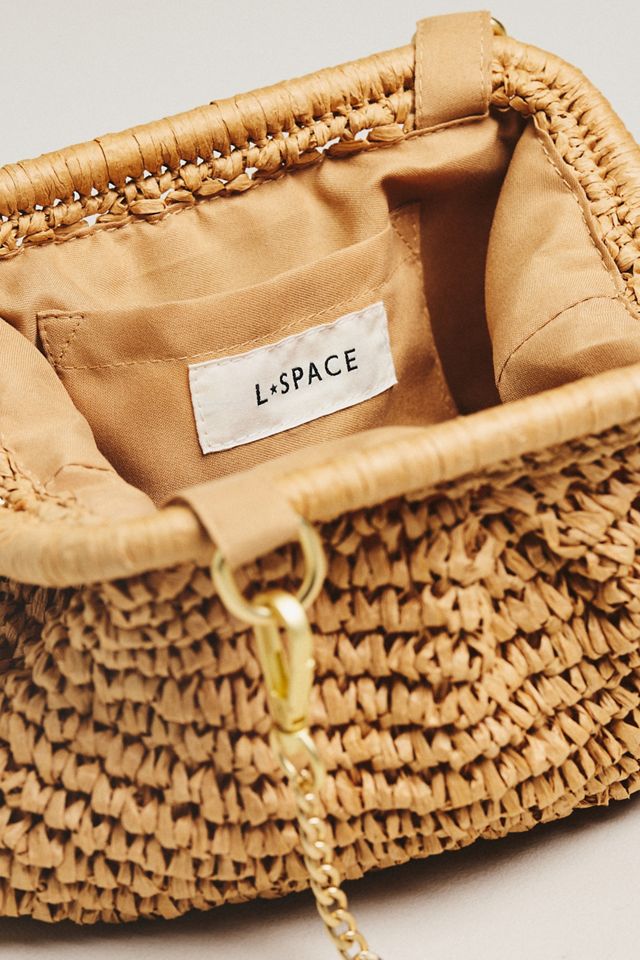 【パーチ】 L Space Harmony Raffia Clutch | Anthropologie