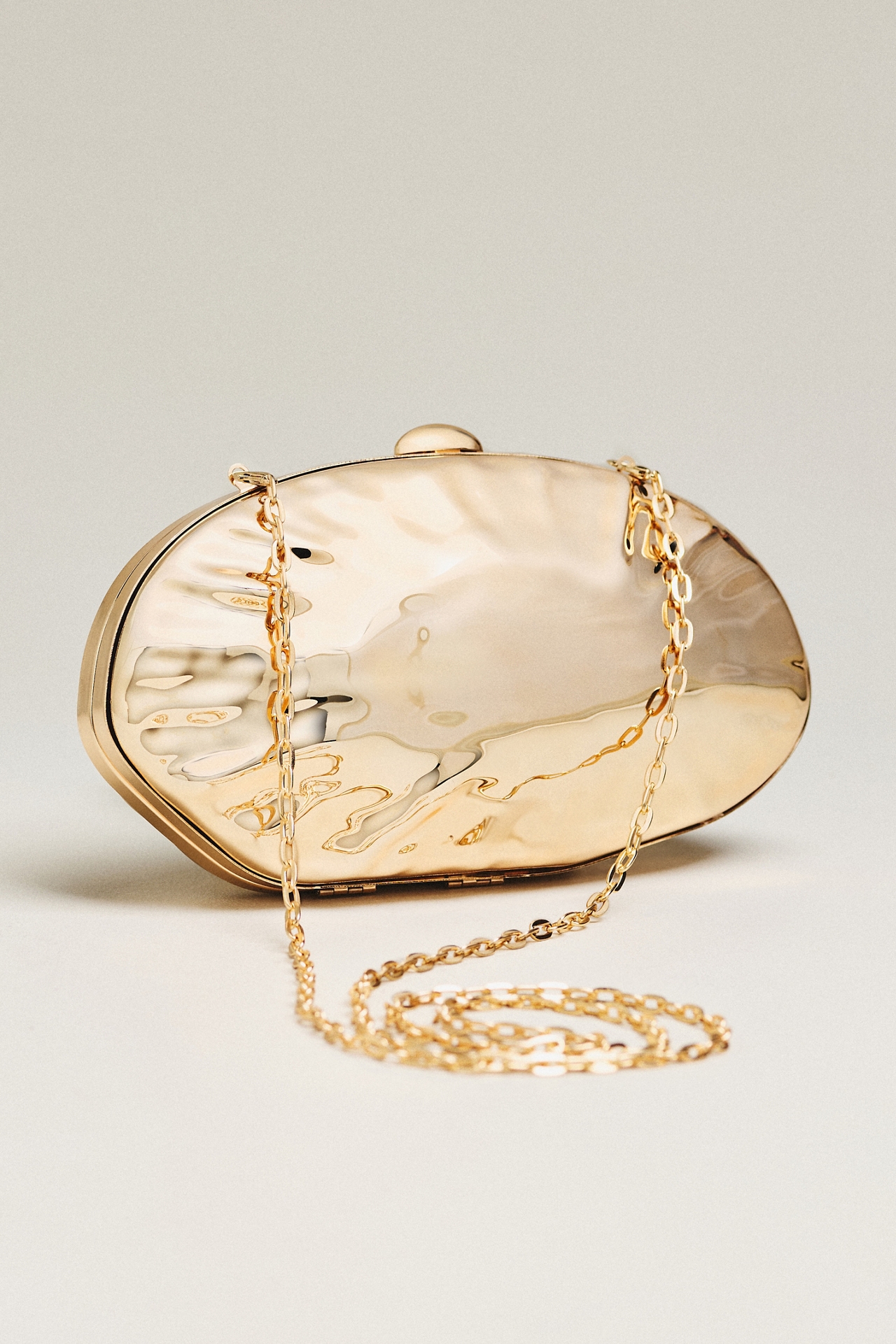 Hammered Seashell Clutch