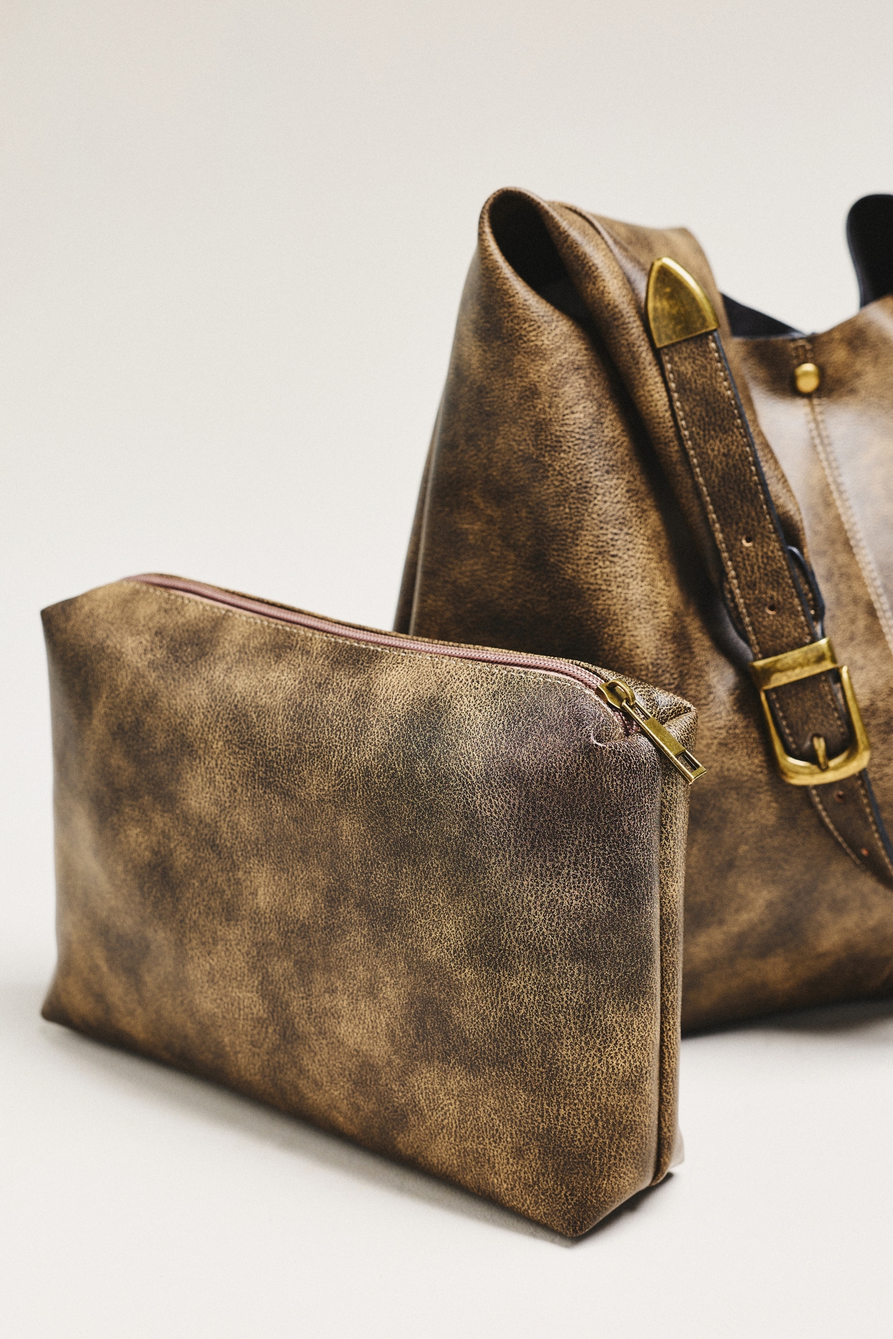 By Anthropologie Love Knot Burnished Buckle Slouchy Bag