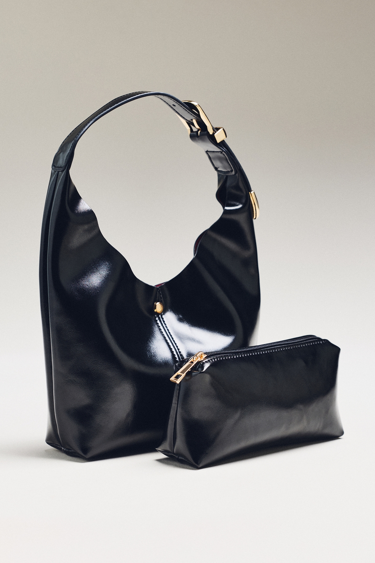 By Anthropologie Love Knot Burnished Buckle Mini Slouchy Bag