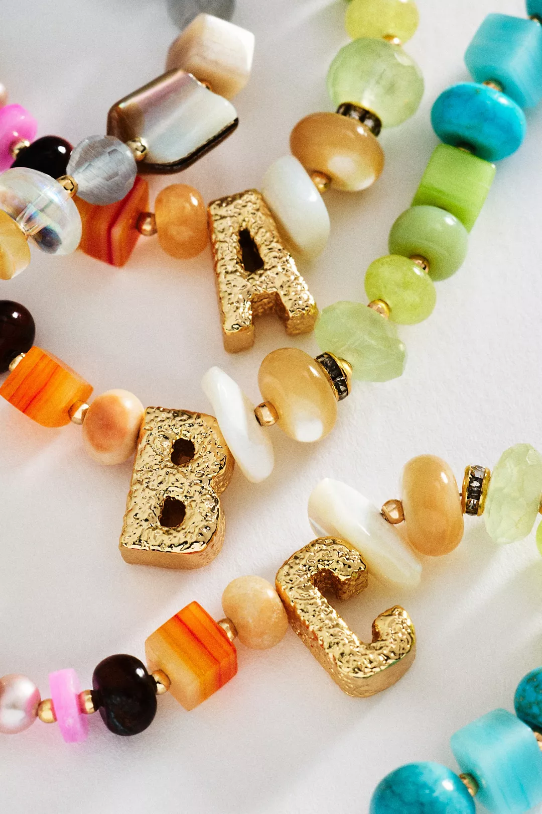 Chunky mixed-bead initial necklace