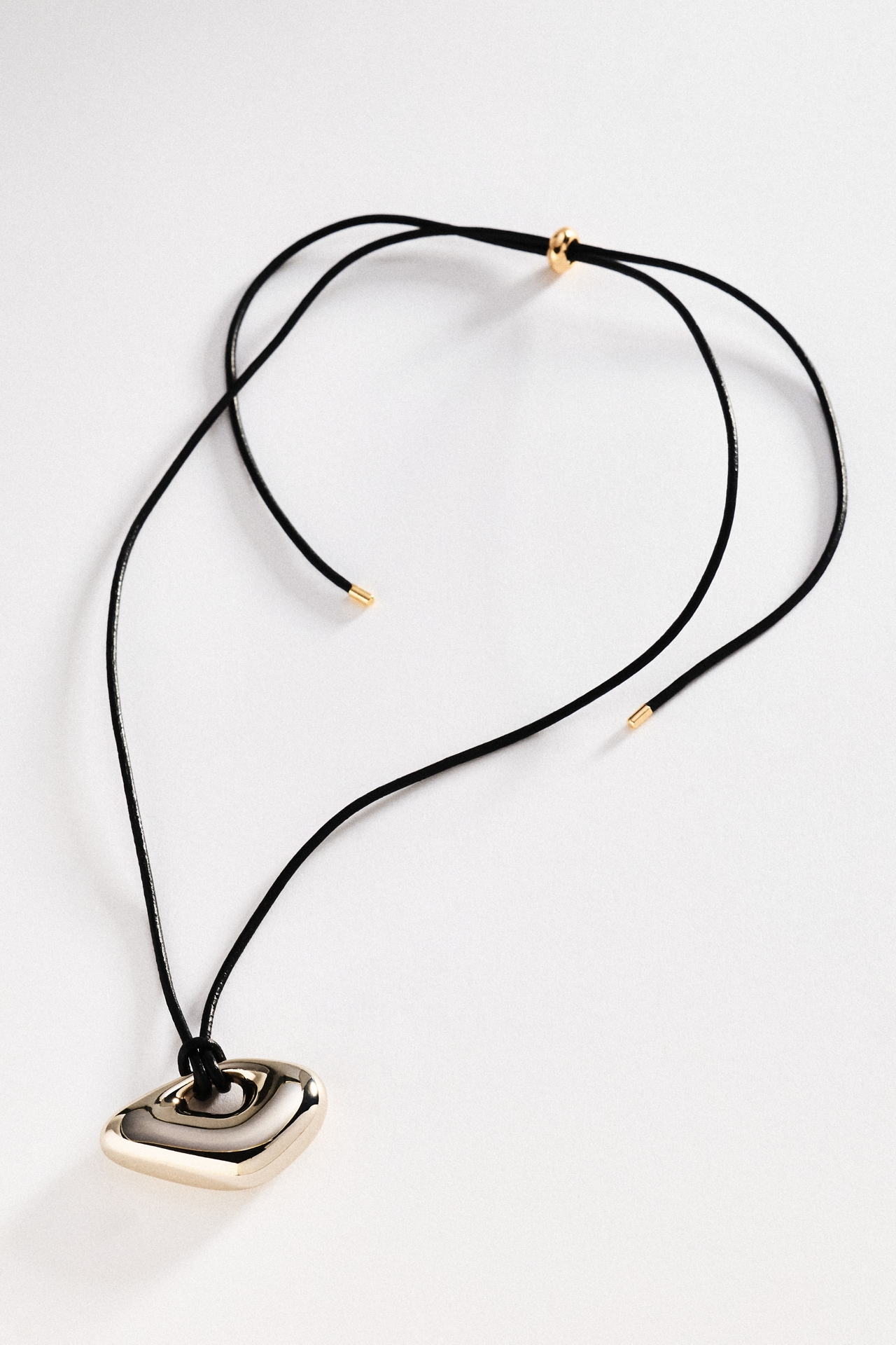 Sculptural Metal Pendant Necklace