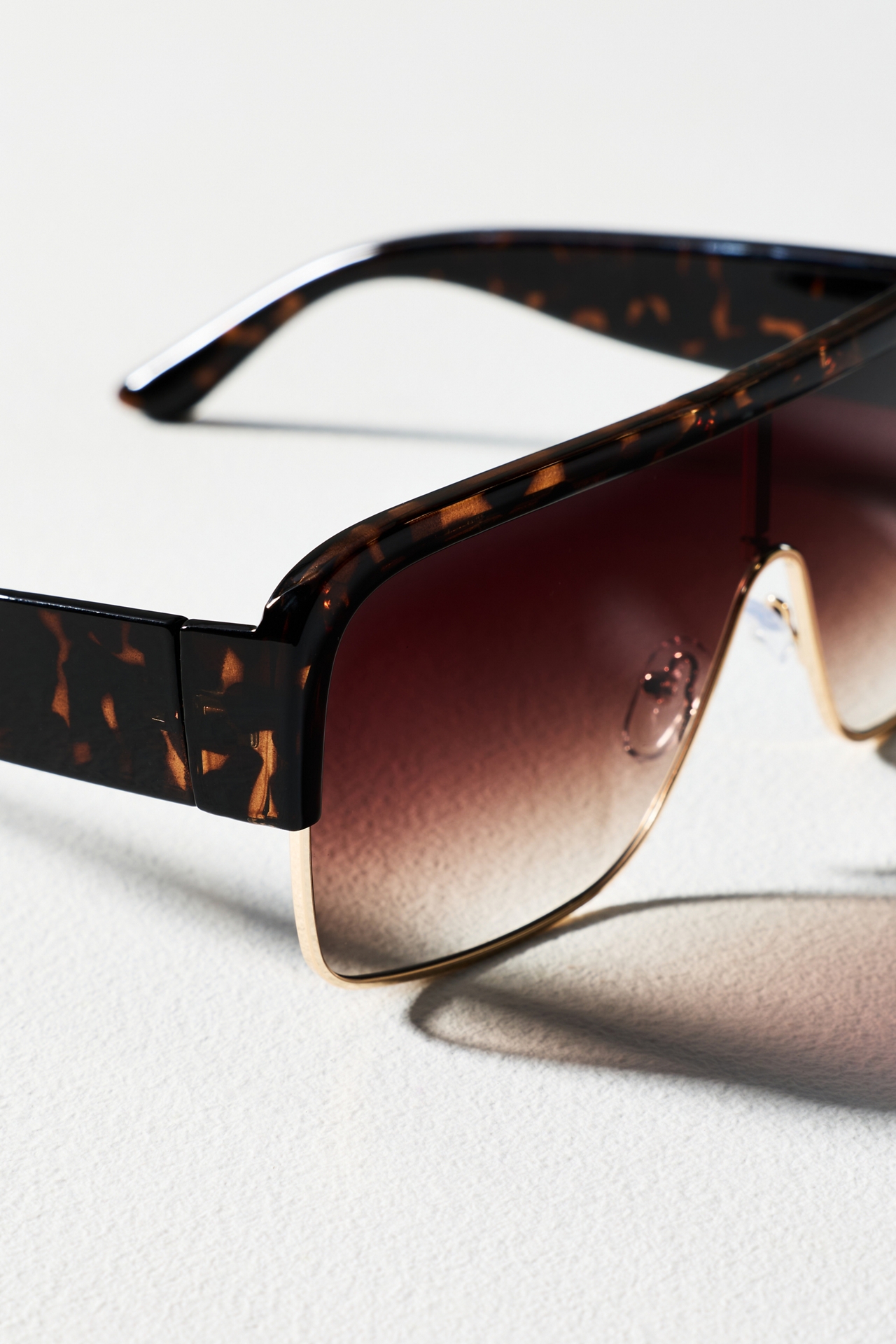 By Anthropologie Flat-Top Frameless Aviator Sunglasses