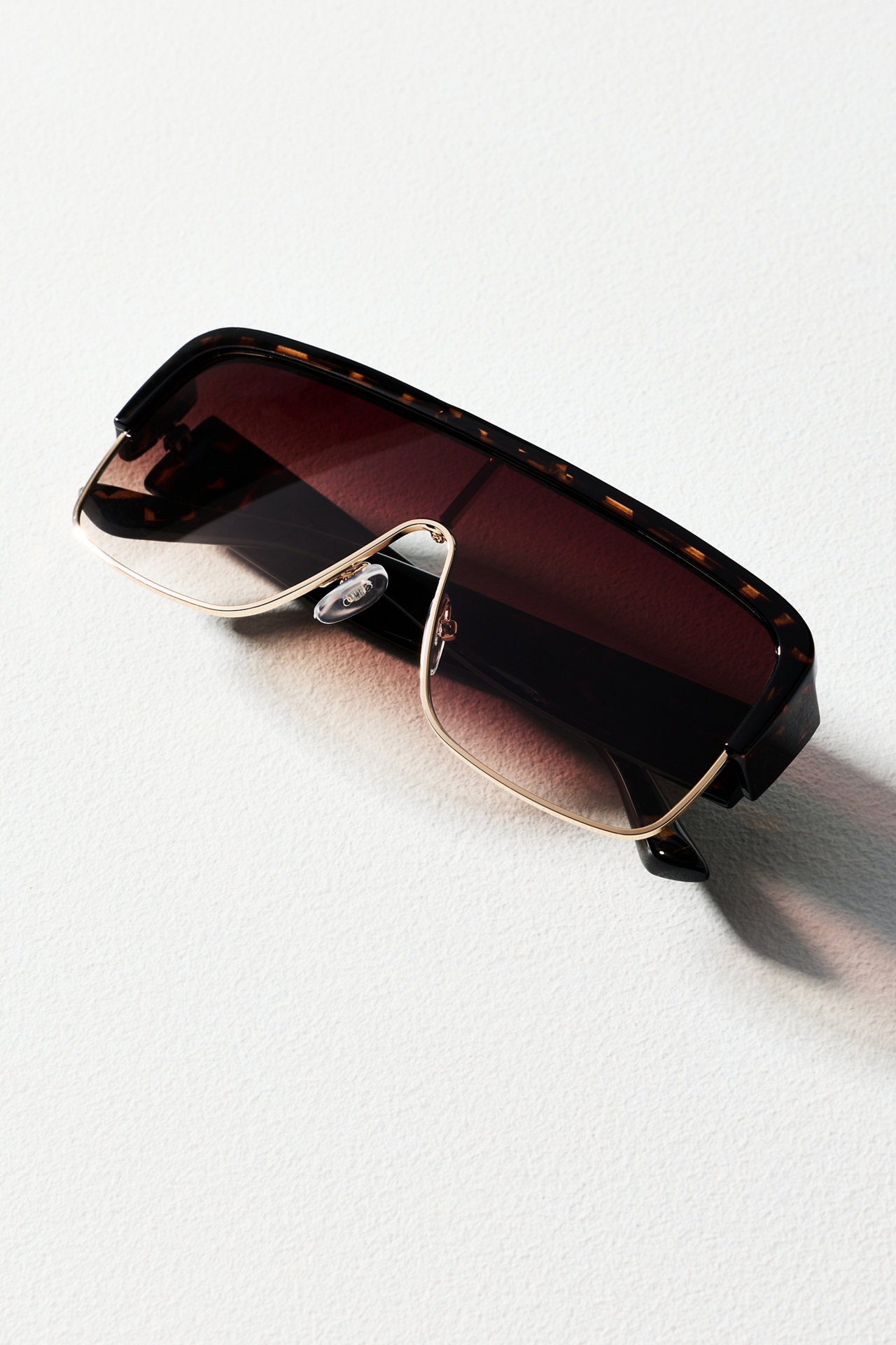 By Anthropologie Flat-Top Frameless Aviator Sunglasses