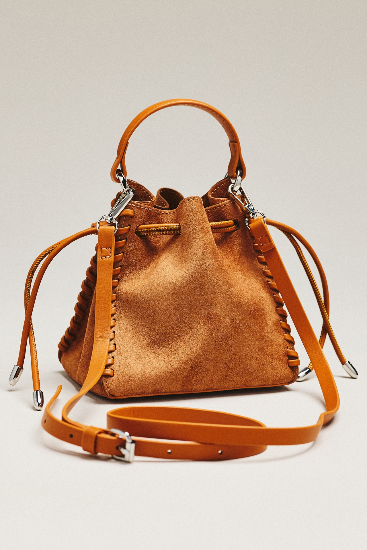 By Anthropologie Faux-Suede Whipstitch Satchel