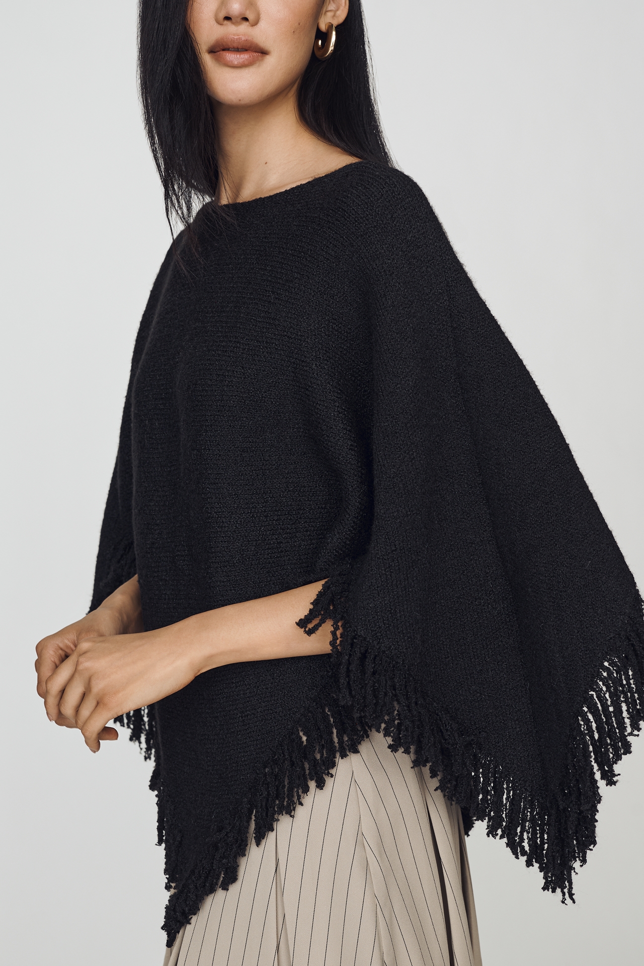 By Anthropologie Knit Fringe Triangle Poncho