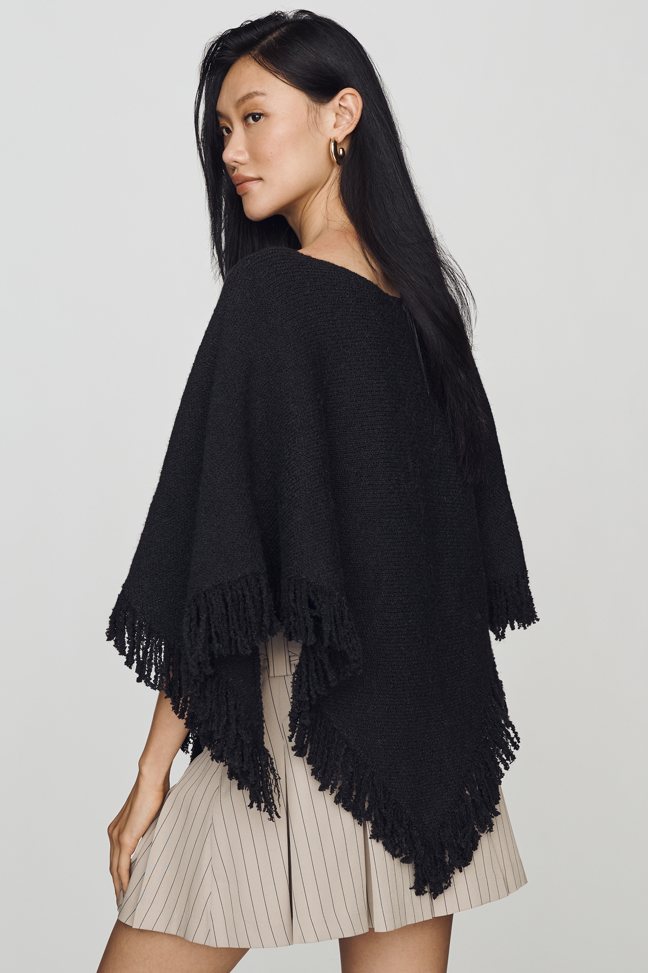 By Anthropologie Knit Fringe Triangle Poncho