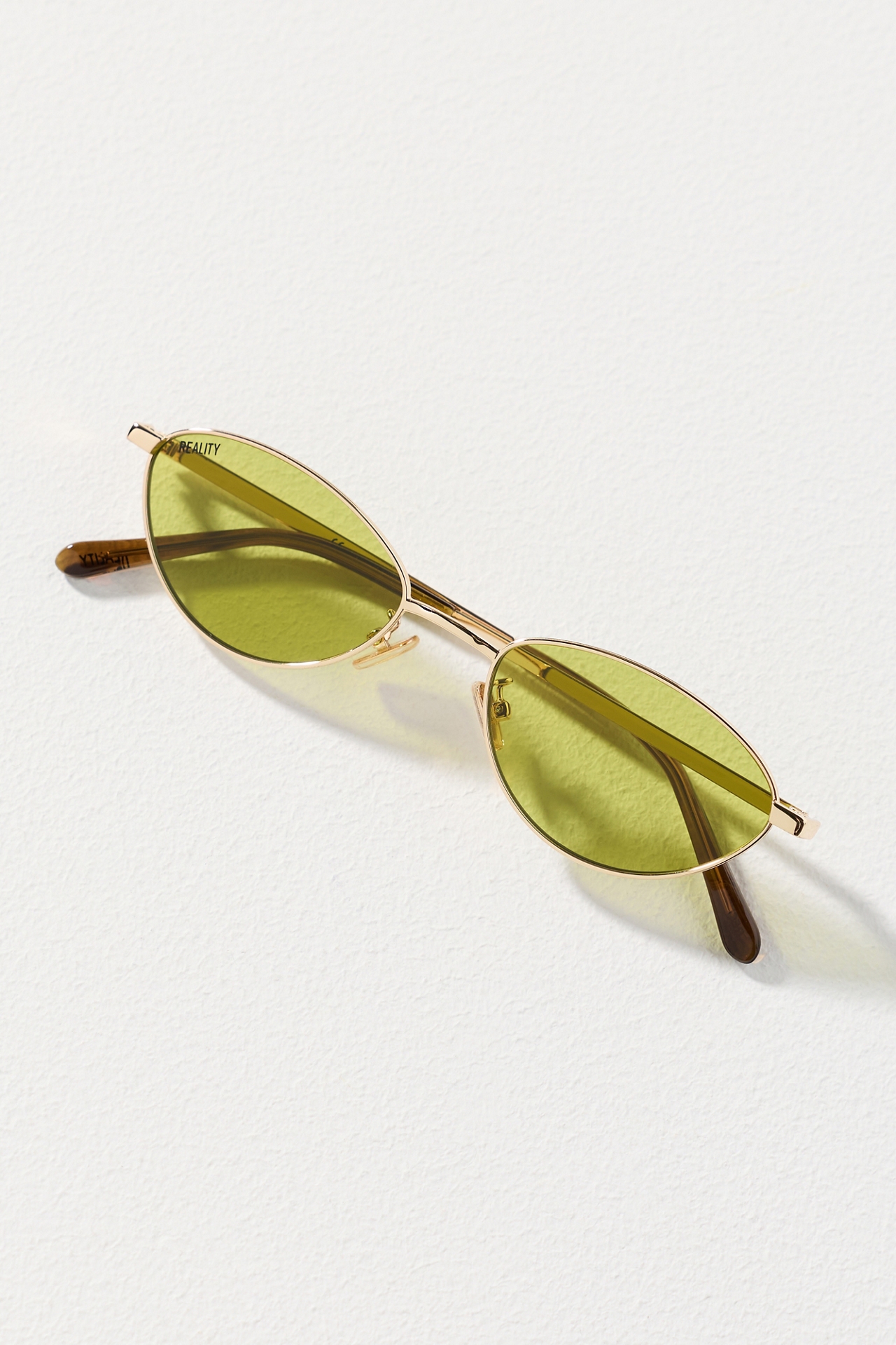Reality Eyewear Small Winged Oval Metal Sunglasses