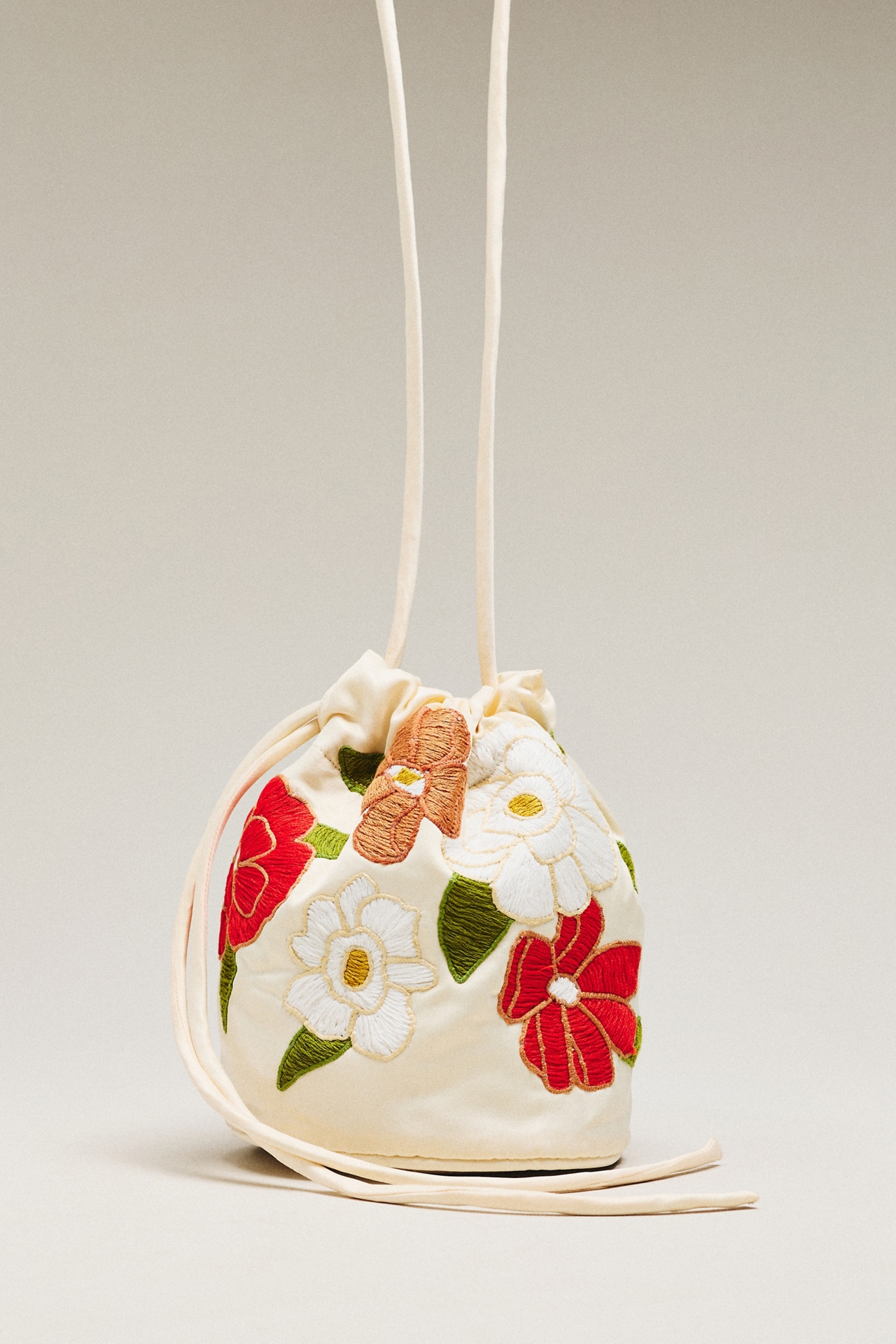 THE GREAT. Embroidered Cinched Bucket Bag