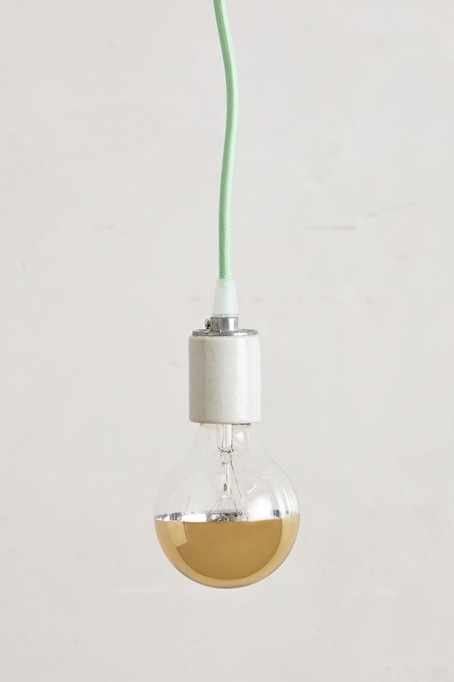 half gold light bulb