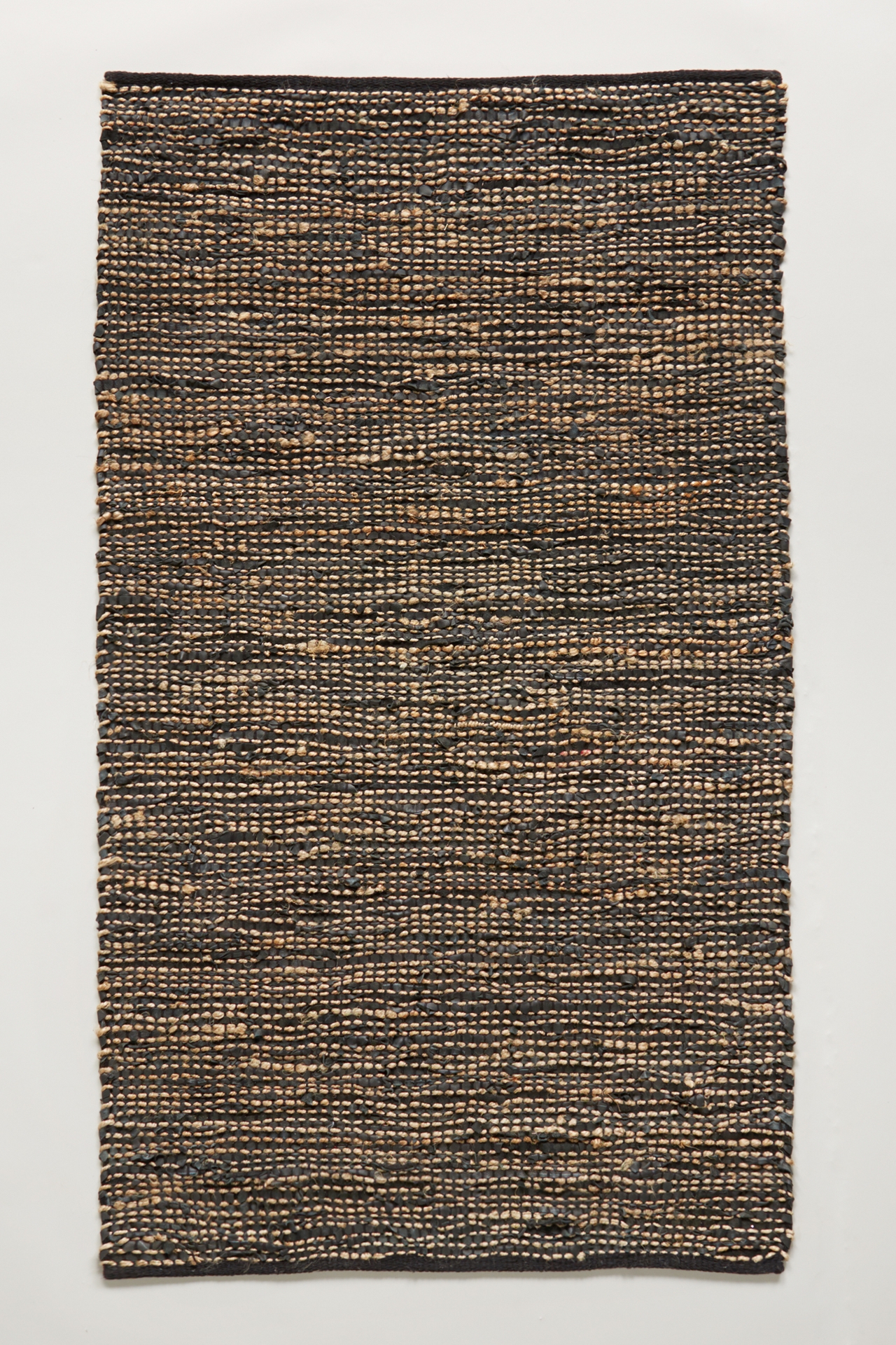 Leather-Twined Rug