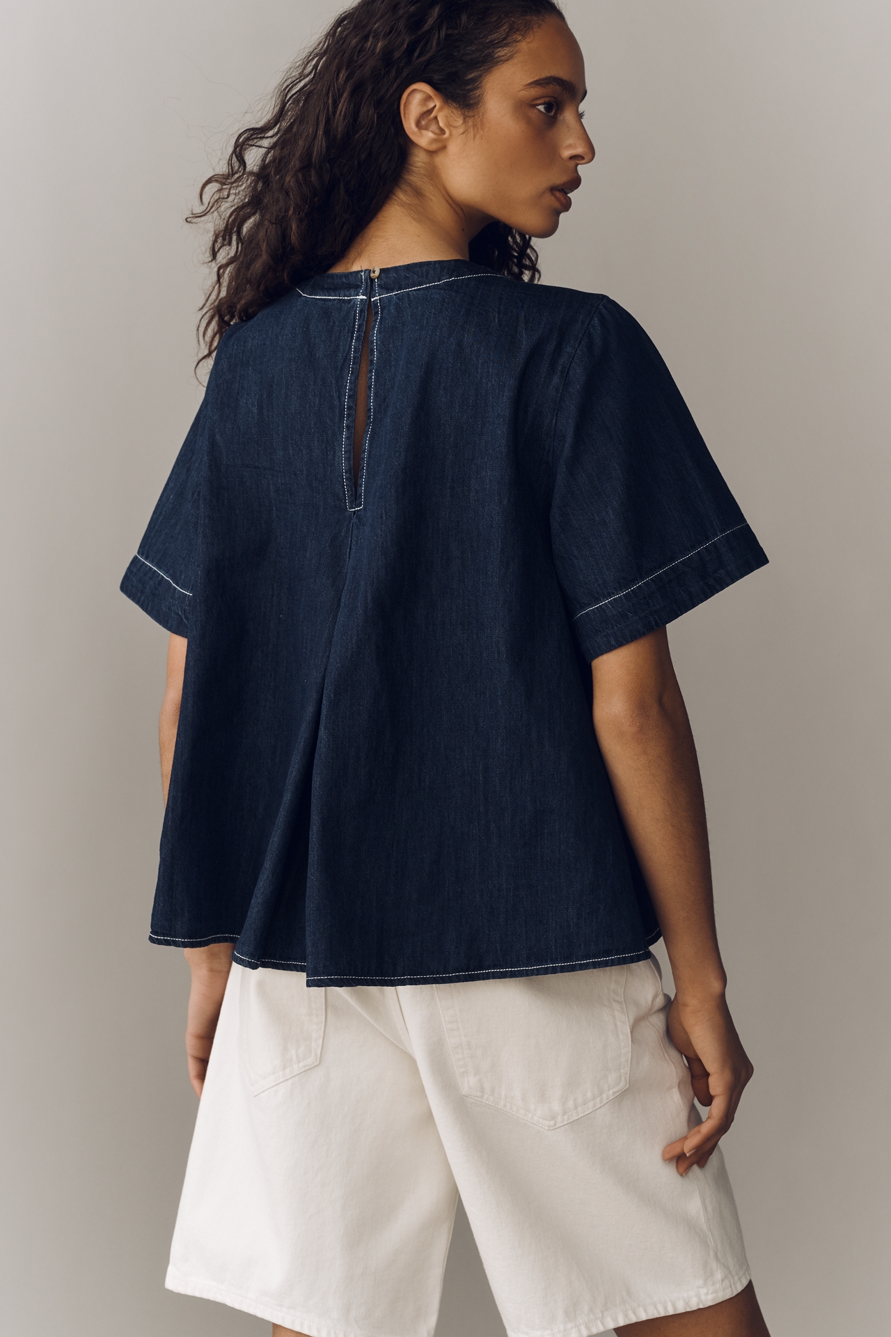 The Emmy Denim Short-Sleeve Swing Blouse by Maeve