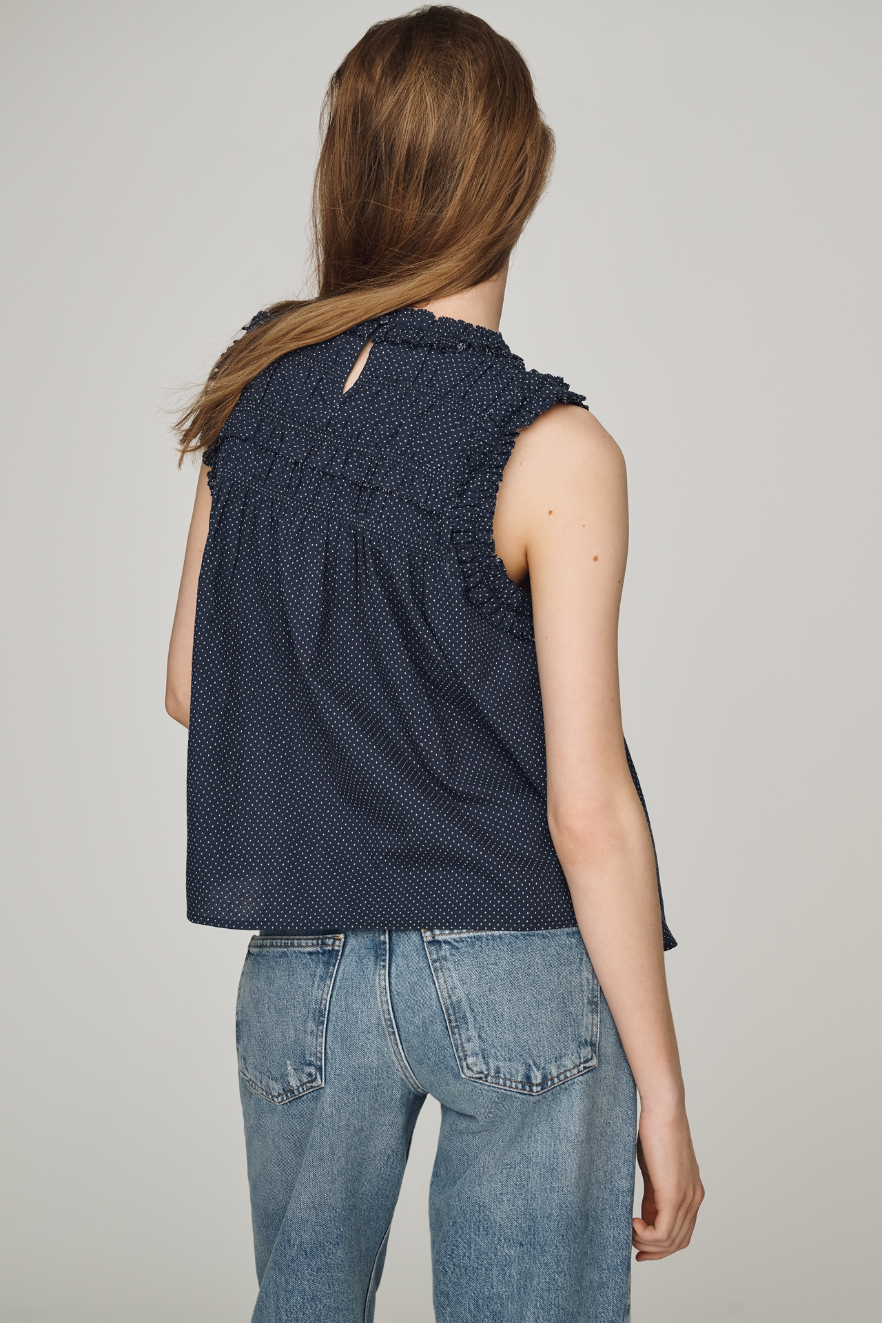 RAISONNEL Ruffle Sleeveless Swing Top