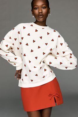 KULE The Oversized Allover Heart Sweatshirt