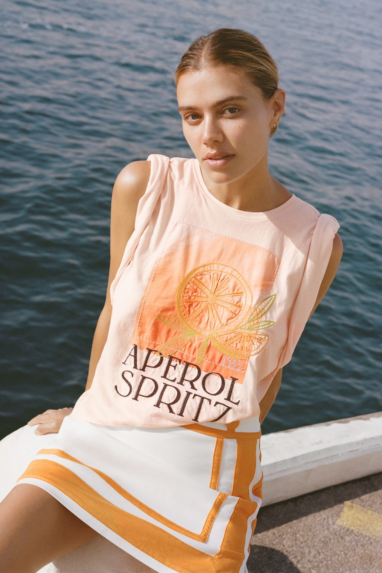 By Anthropologie Aperol Spritz Graphic Tee