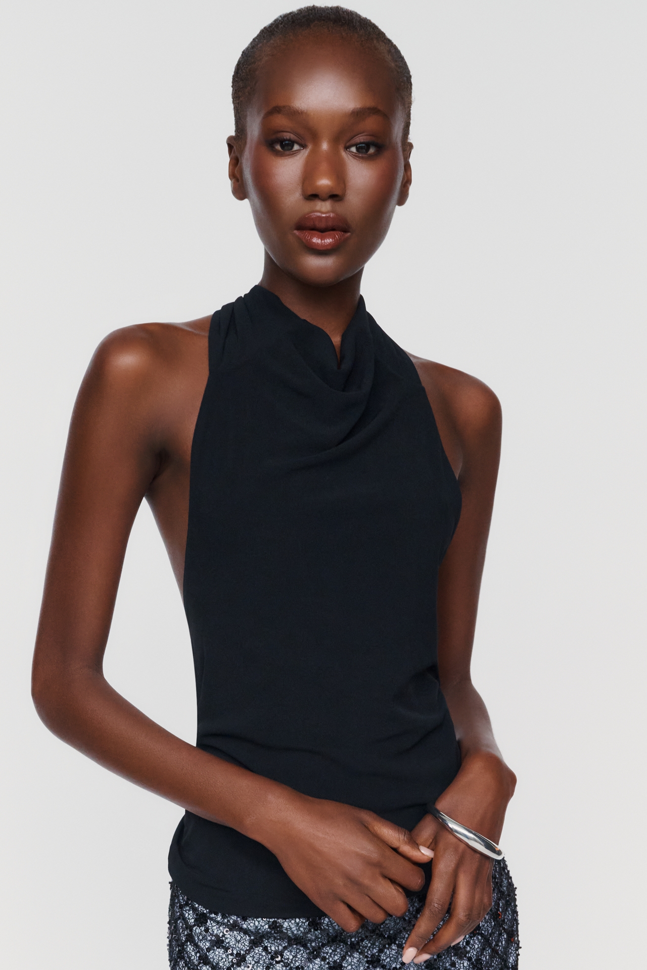 ESTHE Open-Back Fringed Halter Top