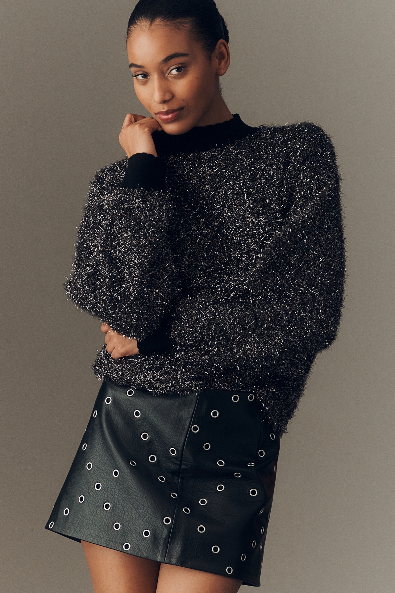 Bl-nk Smart Choice Faux Leather Grommet Mini Skirt