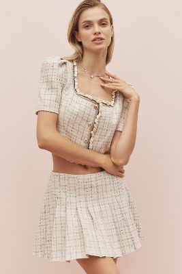 Zoela Jupe Mini Plissée en Beige taille: XS chez Anthropologie - ASTR The Label - Modalova