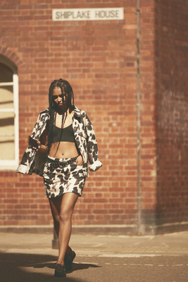 By Anthropologie Cow Print Mini Skirt