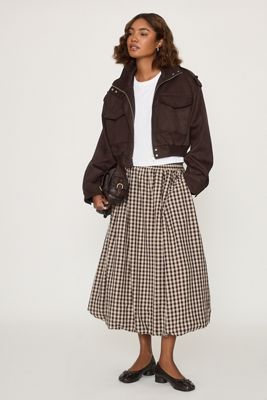 Jupe midi à ourlet bouffant à carreaux By Anthropologie