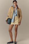 By Anthropologie Faux-Leather Buckle Mini Skirt