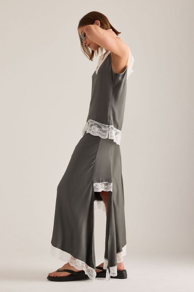 Jupe asymétrique OpéraSPORT Livia à bordure en dentelle #1