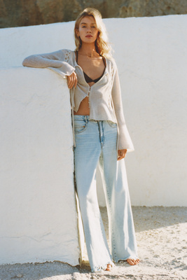 The Adi Regenerative Cotton Mid-Rise Flare Jeans by Pilcro