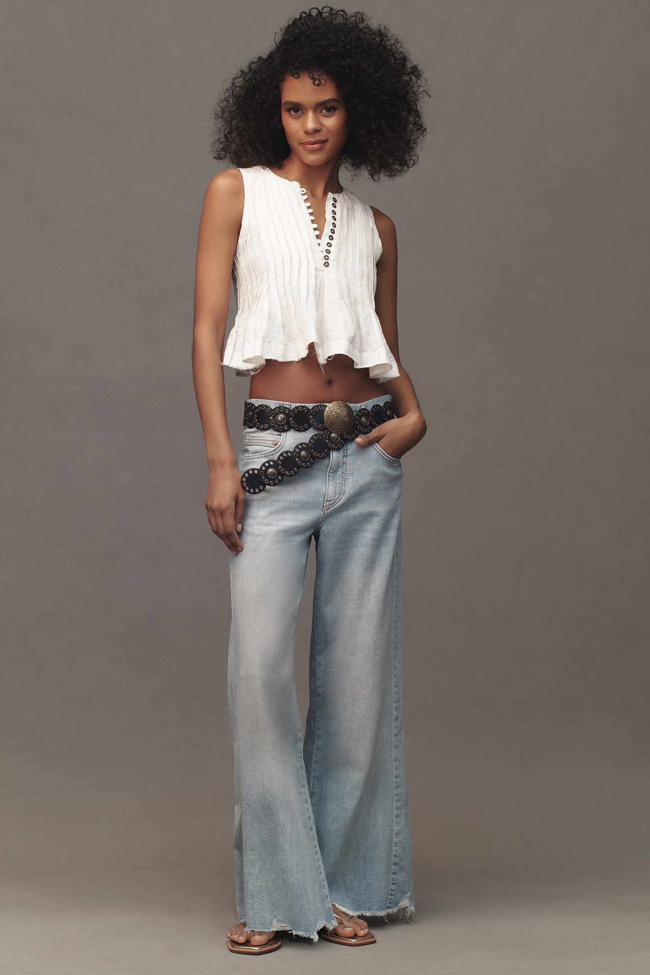 The Adi Mid-Rise Frayed Relaxed Flare Jeans by Pilcro