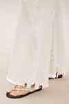 The Adi Mid-Rise Frayed Relaxed Flare Jeans by Pilcro