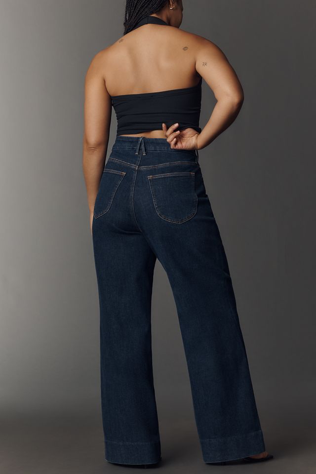 what is holiday dress attire FLARED HIGH-WAISTED JEANS - GREENCAST INDIGO