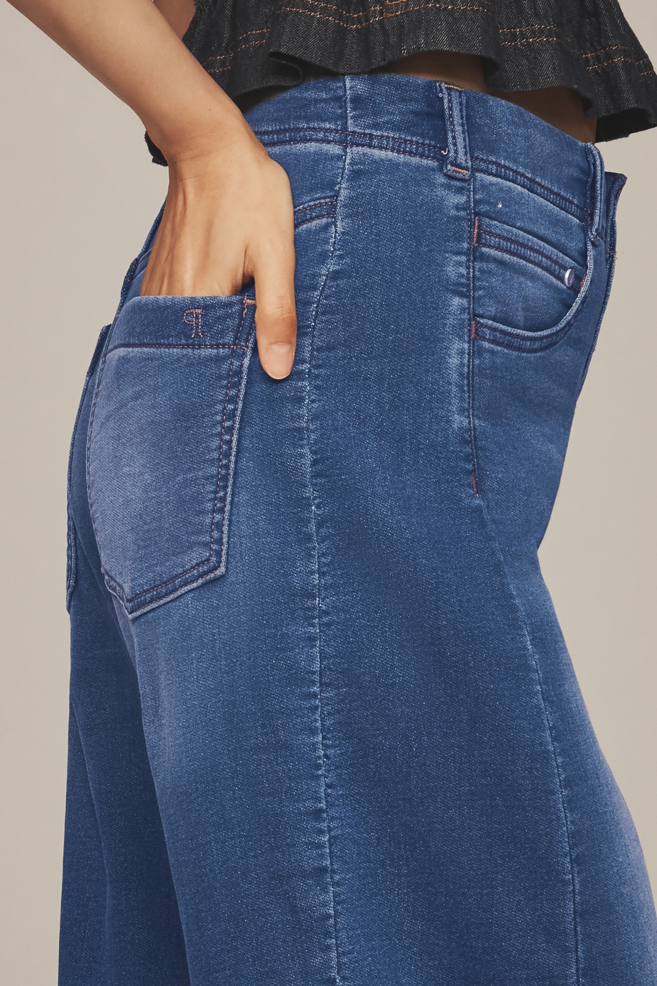 The Adi Knit Mid-Rise Flare Jeans by Pilcro