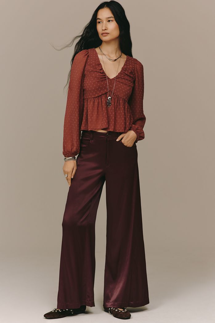 The Adi Silky Mid-Rise Flare Trousers by Pilcro