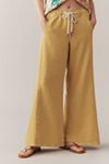 The Adi Mid-Rise Frayed Relaxed Flare Pants by Pilcro: Pull-On Edition