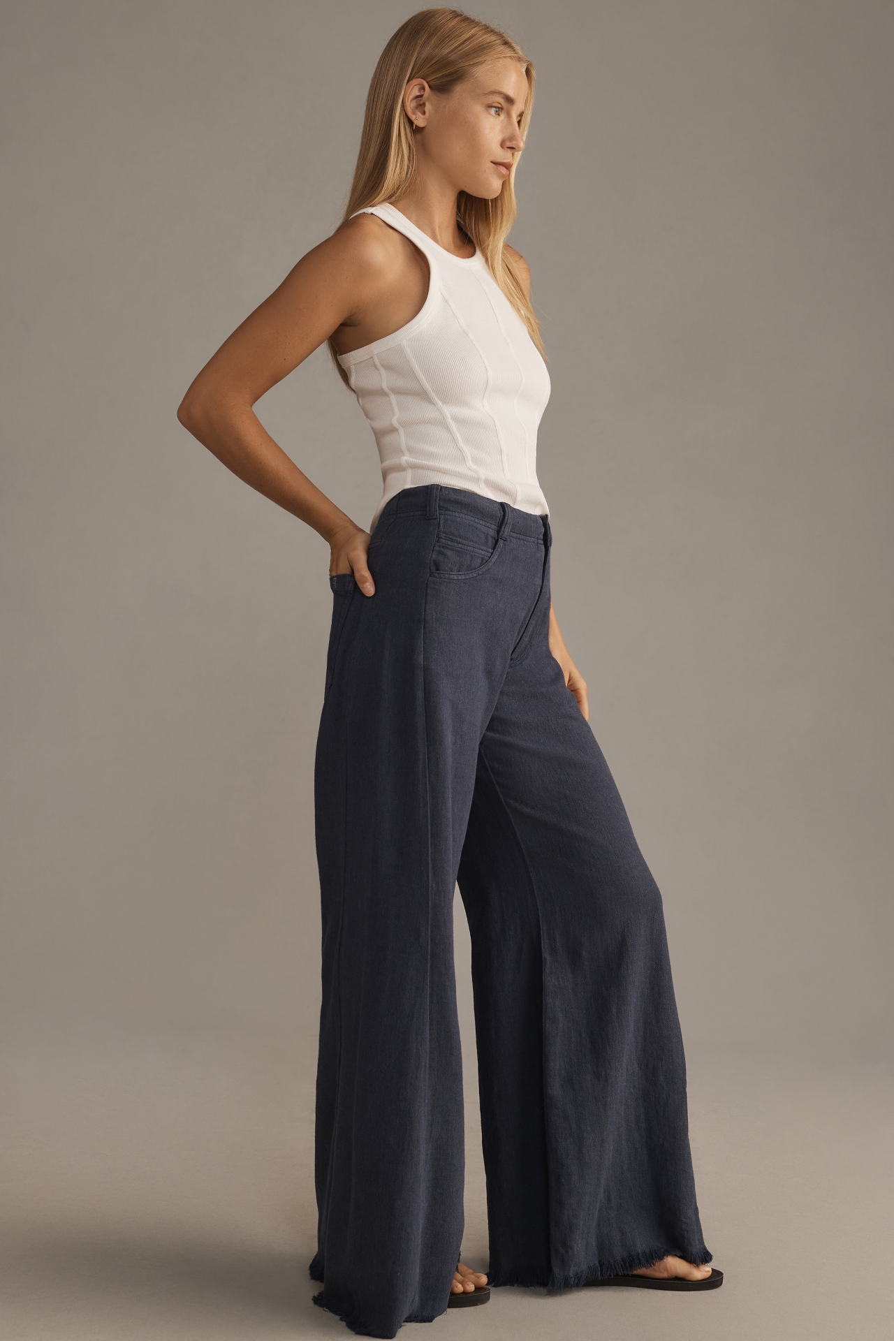 The Adi Mid-Rise Frayed Relaxed Flare Pants by Pilcro: Linen Edition