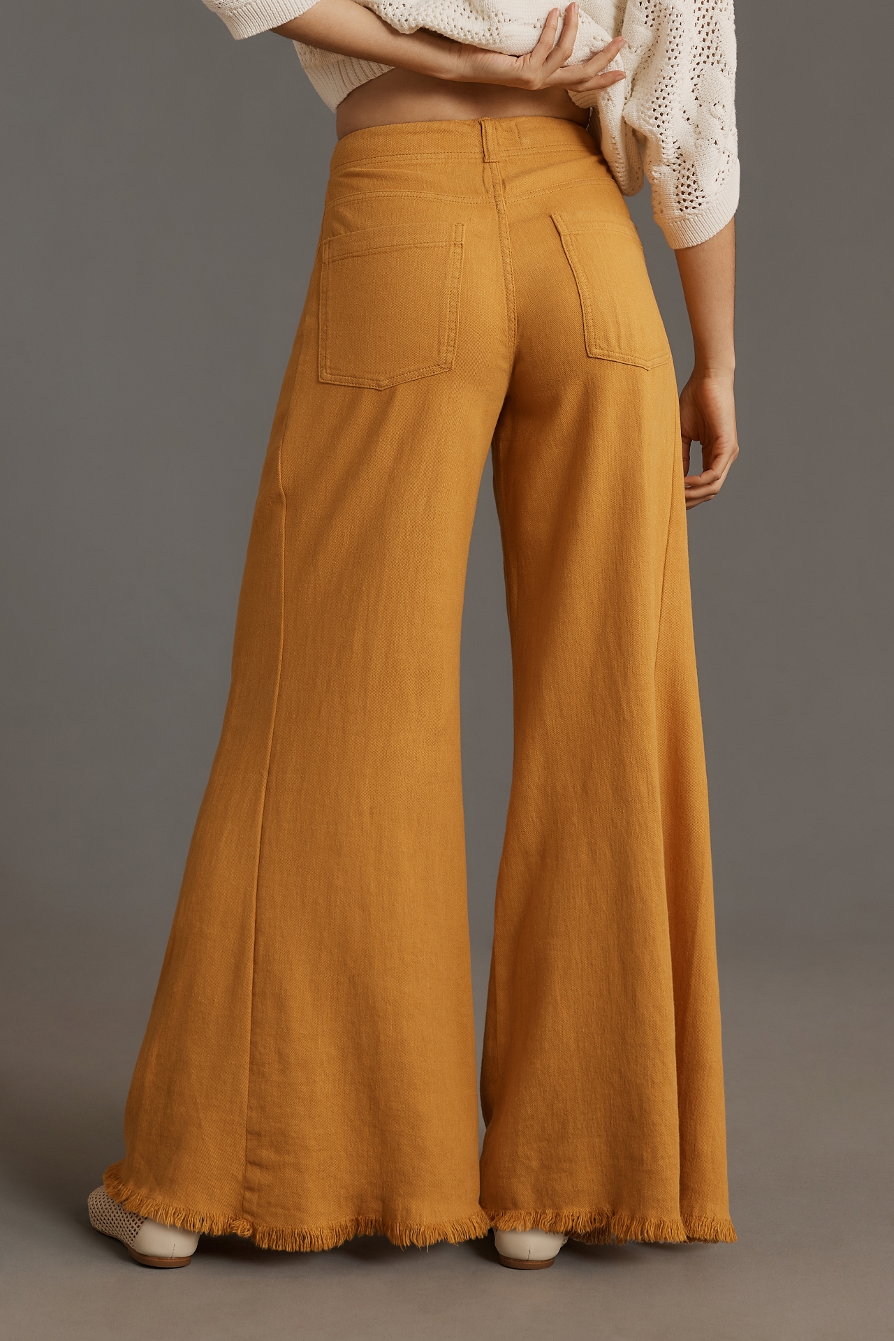 The Adi Mid-Rise Frayed Relaxed Flare Pants by Pilcro: Linen Edition