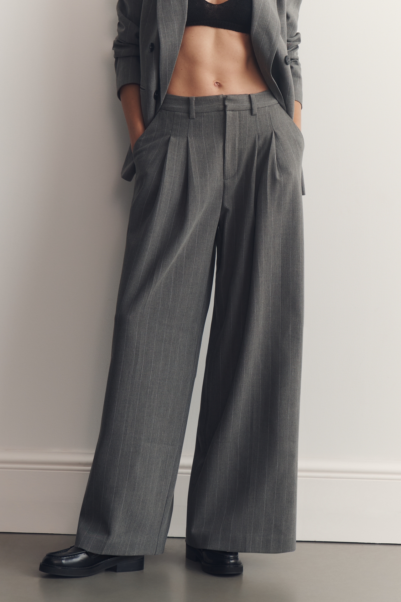 The Avery Striped Pleated Trousers by Maeve