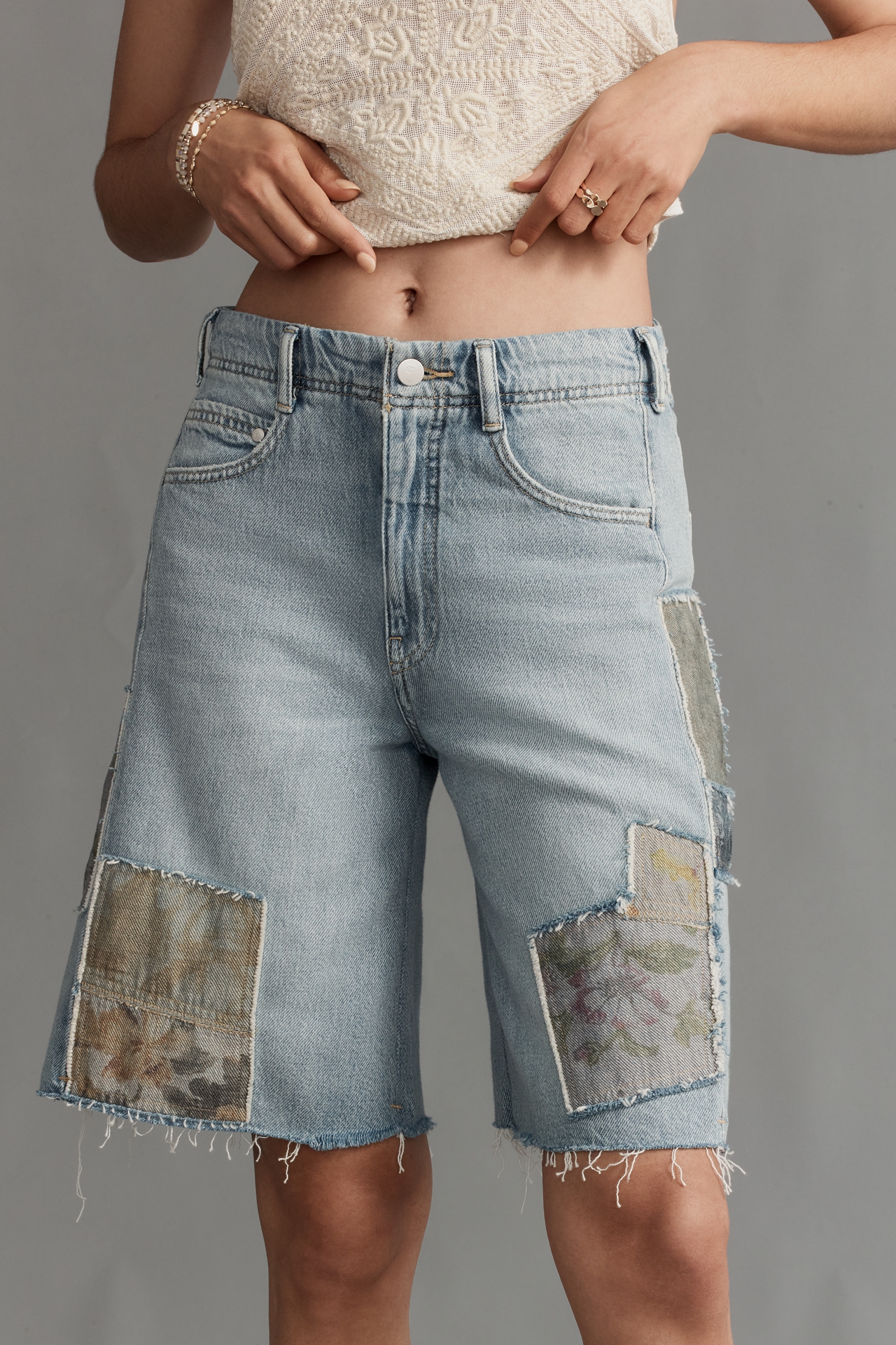 The Adi Patchwork Mid-Rise Relaxed Bermuda Shorts by Pilcro