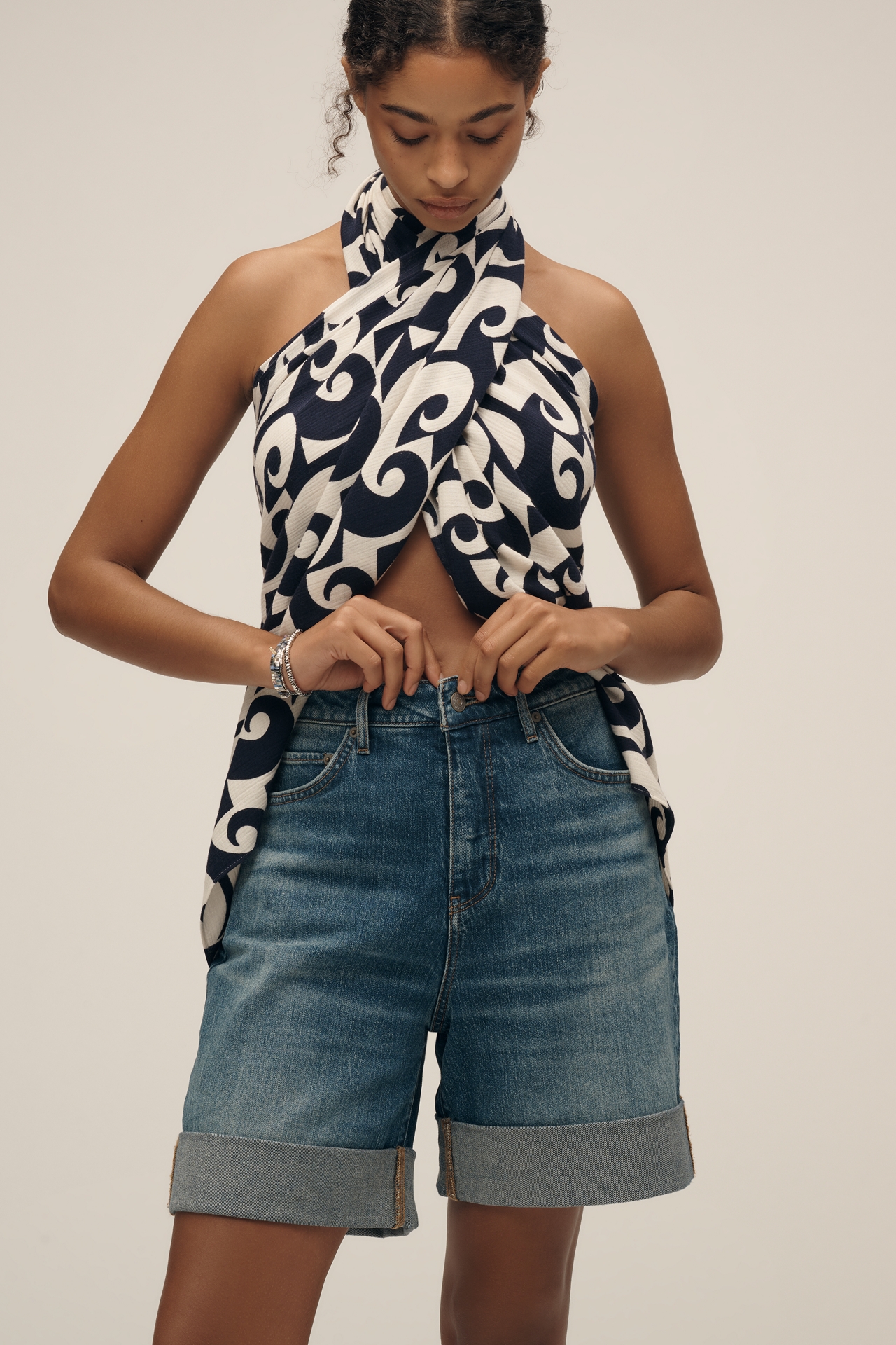The Austyn High-Rise Cuffed Jean Shorts by Pilcro