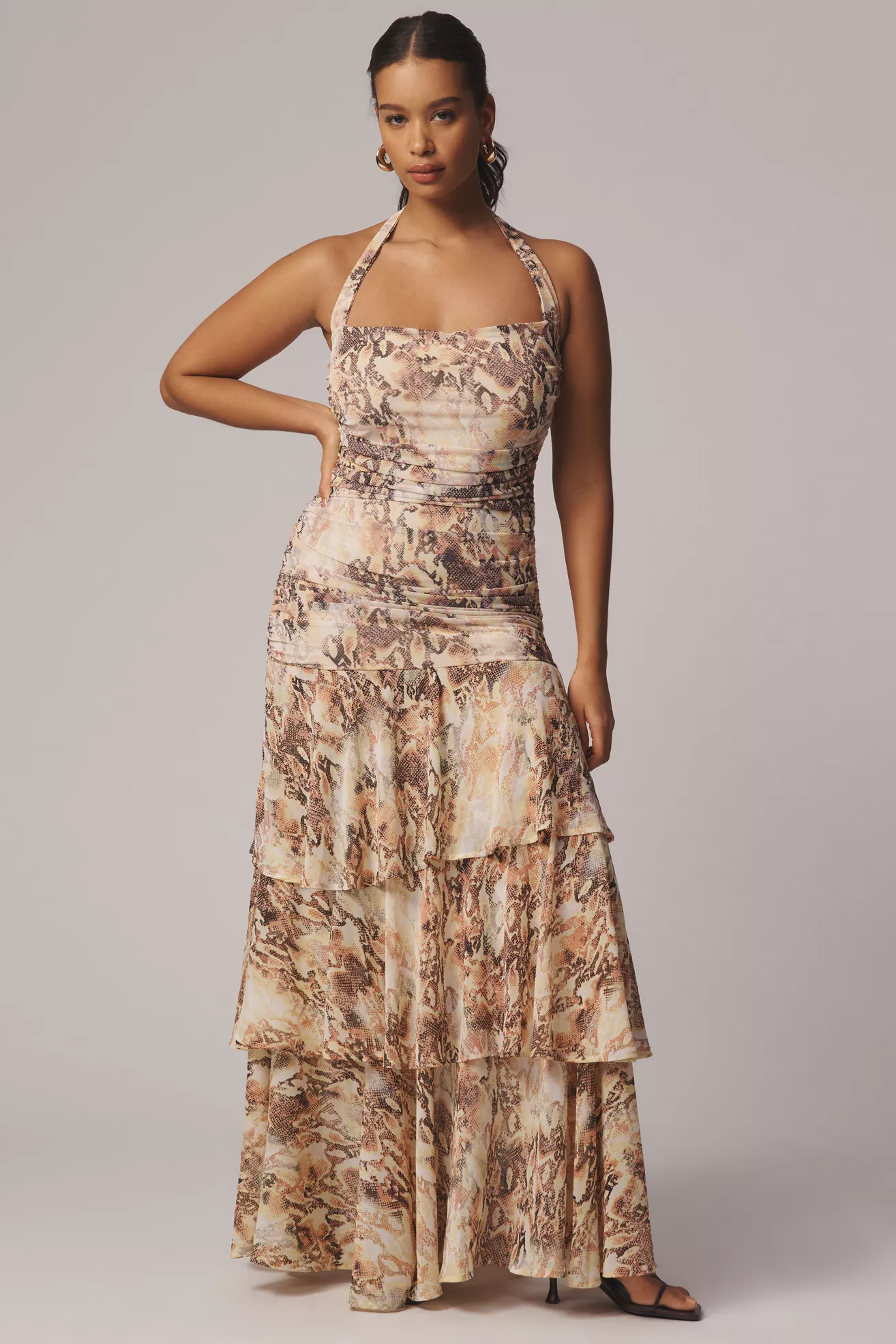 A plus-size, halter, snake print, ruffle maxi dress