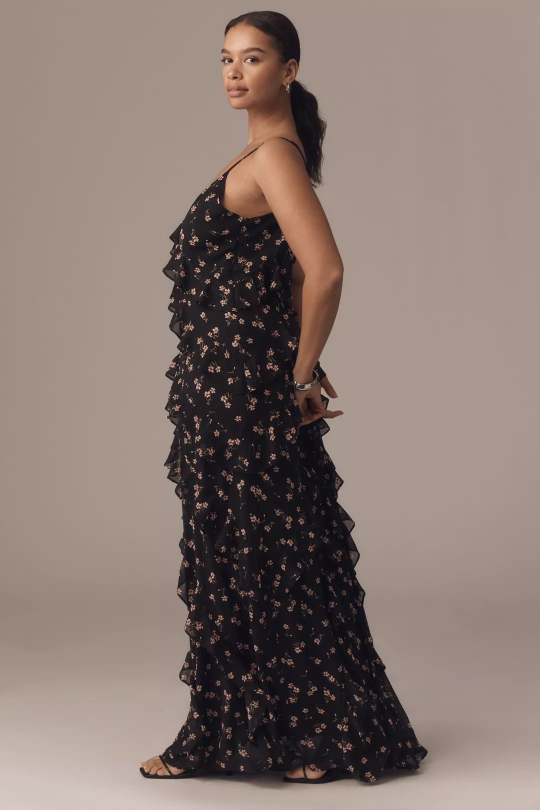 A plus-size black floral ruffled maxi dress