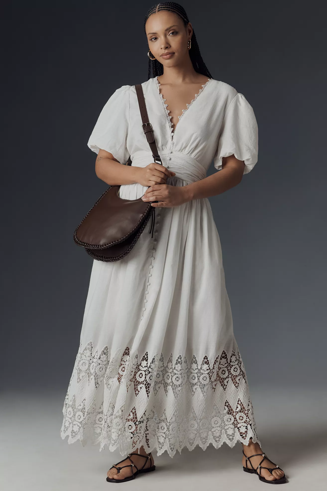 A plus-size, puff-sleeve, white eyelet, maxi dress