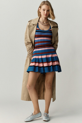 grayscale photography of assorted shirts hanged on clothes rack