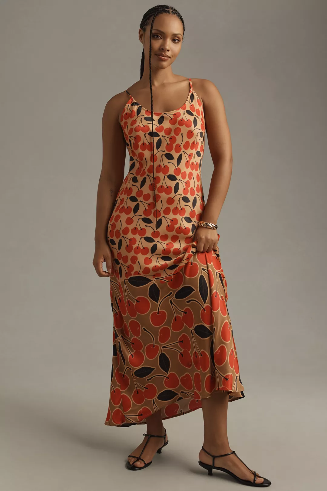 A plus-size, cherry-print slip dress