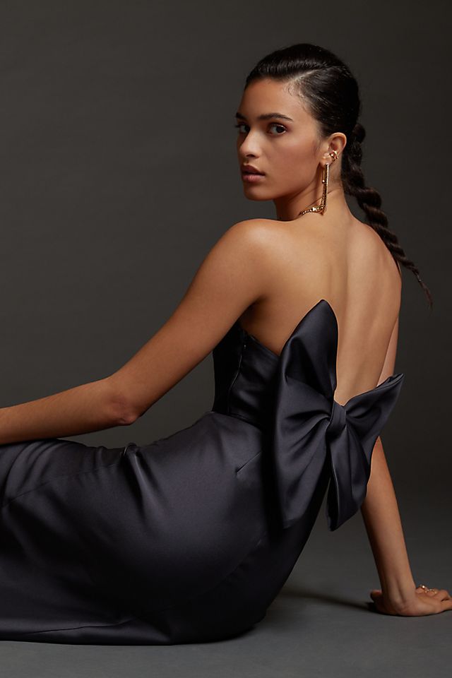black dress with bow at the back Mon Petit Chou inspired short sleeves and a dramatic mermaid hem Slim Bow-Back Midi Dress |