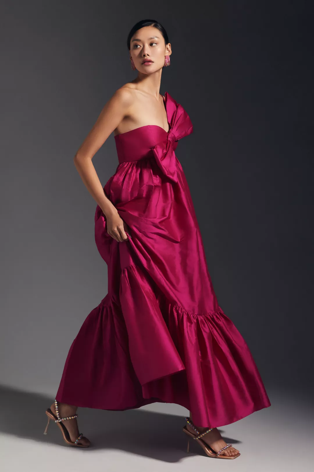 With voluminous tiers and a larger-than-life bow adorning the sweetheart neckline, this Atsu dress is primed for any special occasion in your diary.