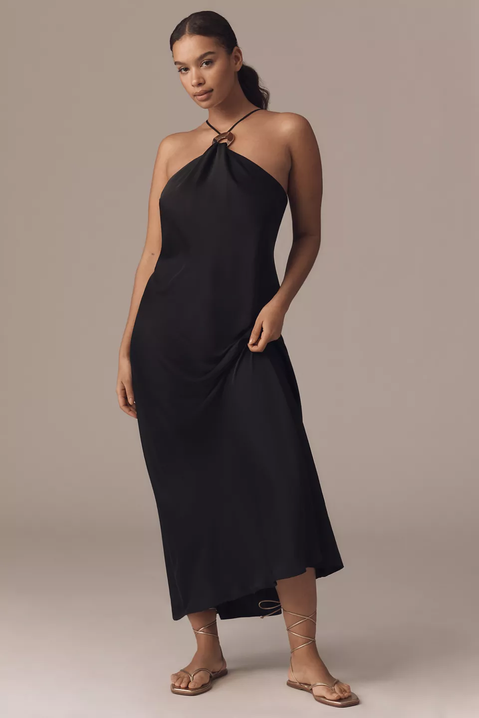 A plus-size black halter slip dress