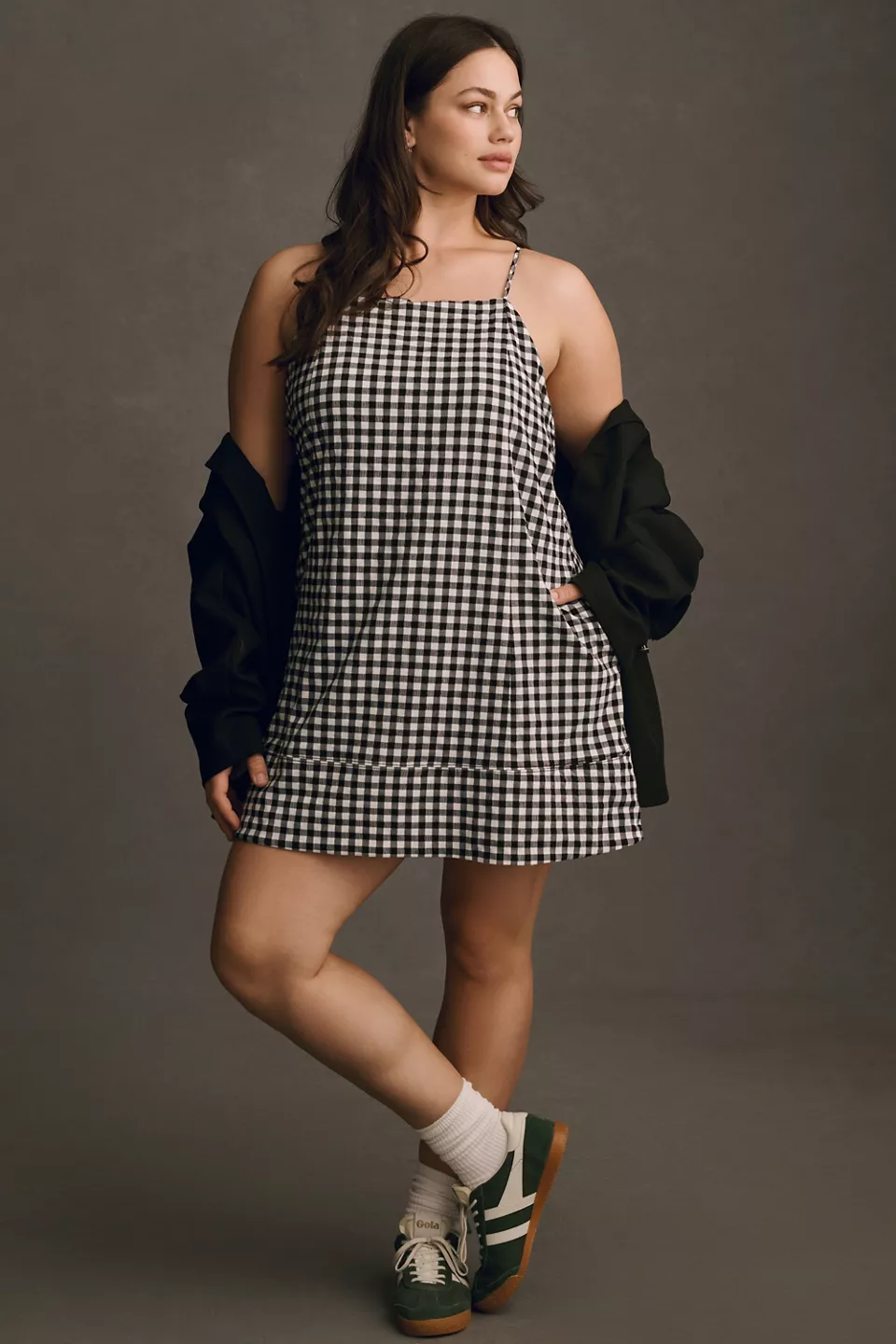 A plus-size, black-and-white gingham mini dress