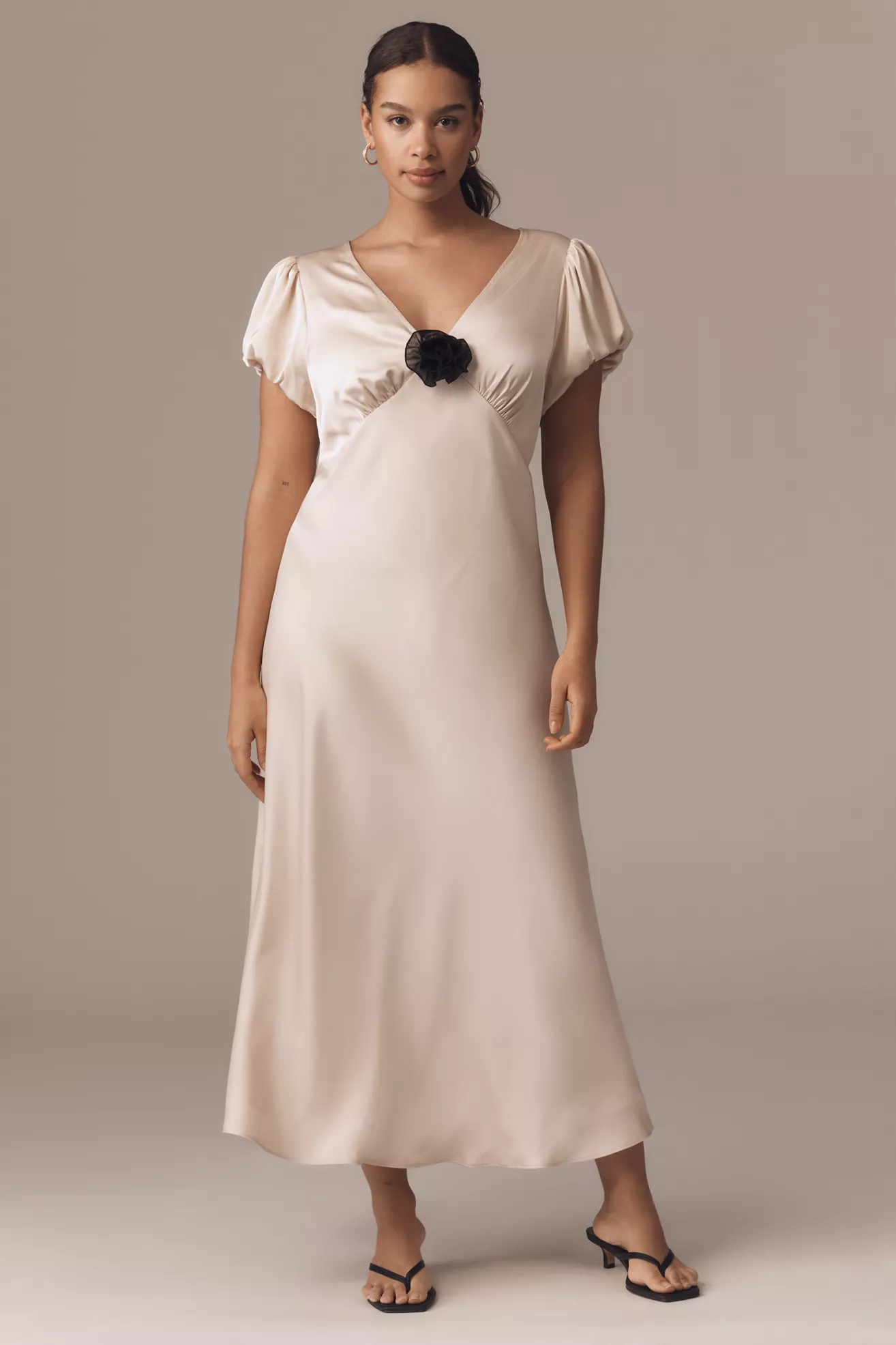 A plus-size, off-white, rosette-detail,  slip dress