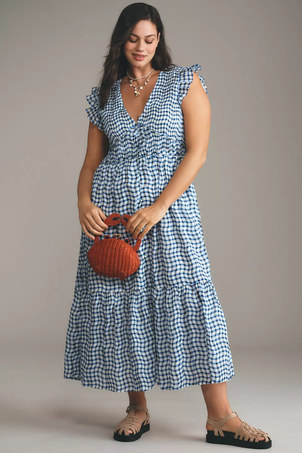A plus-size, blue-and-white wavy gingham midi dress