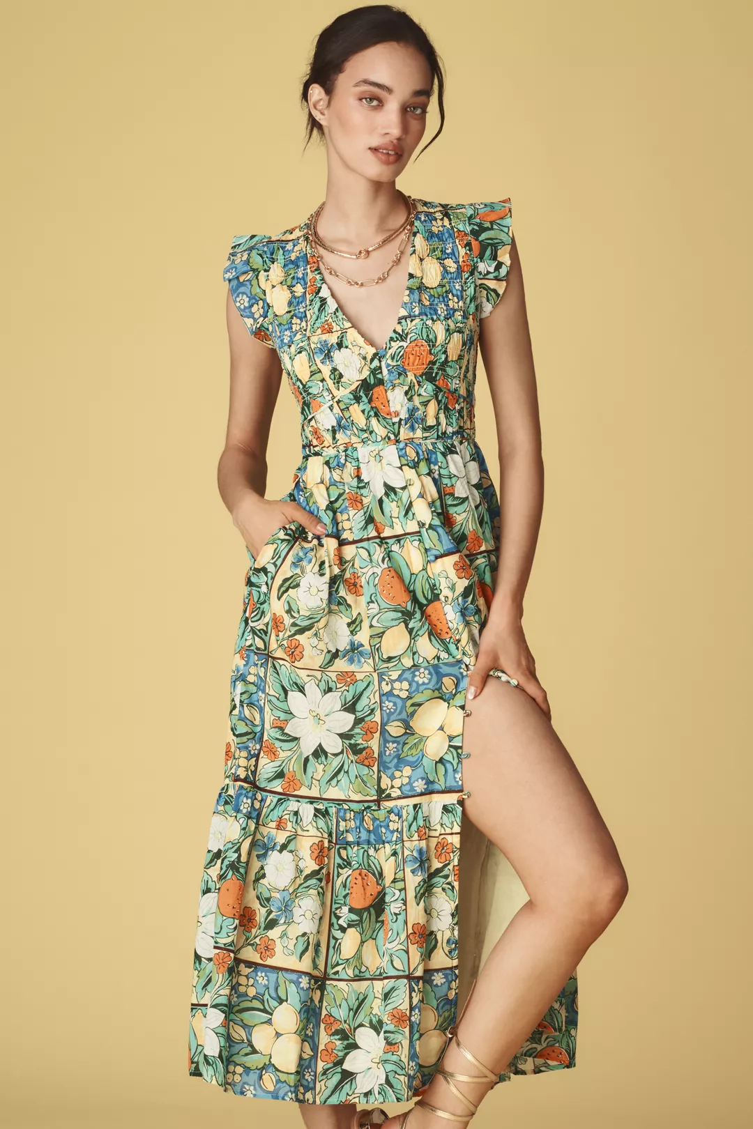 A fruit- and floral-print midi dress